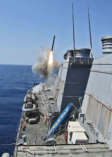 USS Barry (DDG-52), which might close her range with Syria this month, firing a Tomahawk in 2011 (U.S. Navy photo by LTJG Monika Hess/Released)