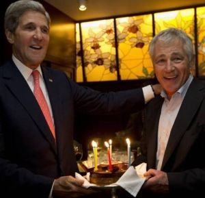 Kerry, taking time off from promising not to regime-change Kim Jong-Un, surprises Hagel with a birthday celebration in Tokyo.  Reuters pool photo