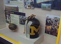 A replica of the Little Brown Jug on display at Michigan. (The original, which carried Coach Fielding Yost's water, is kept in storage.)