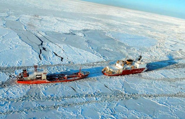 US Coast Guard Cutter Healy (WAGB-20) cuts a path through Arctic ice in support of a winter resupply mission to northern Alaska. (USCG photo)